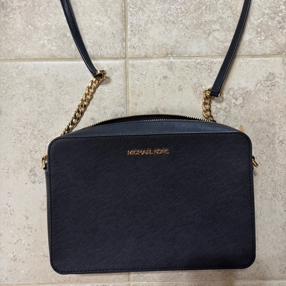 Michael Kors Black cross body bag with gold chains